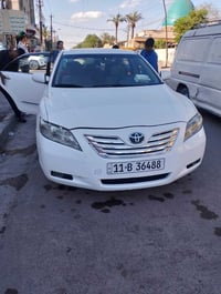 شباب  كاميري موديل 2009 ابيض اللون رقم بغداد نكليزي الجديد بأسمي تحويل...
