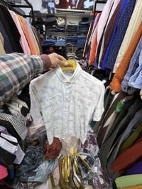 قميص رجالي • ملابس