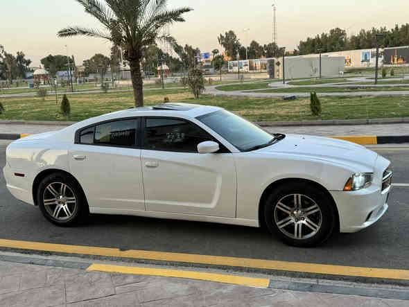 سلام عليكم دوج جارجر 2014ابيض خليجي فول مواصفات 
فتحه سقف 
غرفه جلد احمر 
شفتات ستيرن
كير ماوس 
شاشه جبيره 
هواي بيهه موصفات معروف الخليجي

سياره جديده صار شهر من امبدل كير ومكينه وعربانه خلفيه وضفيره مال 17سياره مصروف عليهه تخم تاير جديد 
ويل خليجي سياره ما يحتاج ألهه ربع 
رقم جديد دولي بسمي بغداد 
سياره بيها جاملغ وبنيد مبدلات نفس ألون جاملغ خلفي مصبوغ نصه 
العنوان بغداد الشعب  

ما متواجد ع فيس 
رقمي ***********
