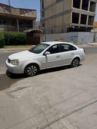 اوبترا للبيع موديل 2011 رقم اربيل  سنويه نافذه سعر70 ورقه مكان السياره...