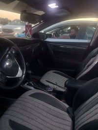 كورولا موديل 14 امريكيه بيه حدث بل باب الخلفي   بيه بارد الباب الصدر و...