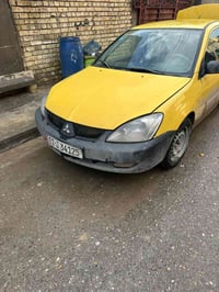 لانسر للبيع 2010 مكينه كير تبريد تخمم تاير جدد السعر 52 وبيها مجال قلي...