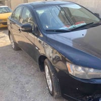 لانسر قرش ياباني موديل 16  70 وبيها مجال 07714373088