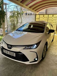 للبيع كورلا هايبرد شكل الخليجي باب اول العلامه الزركه موديل 2024  سيار...