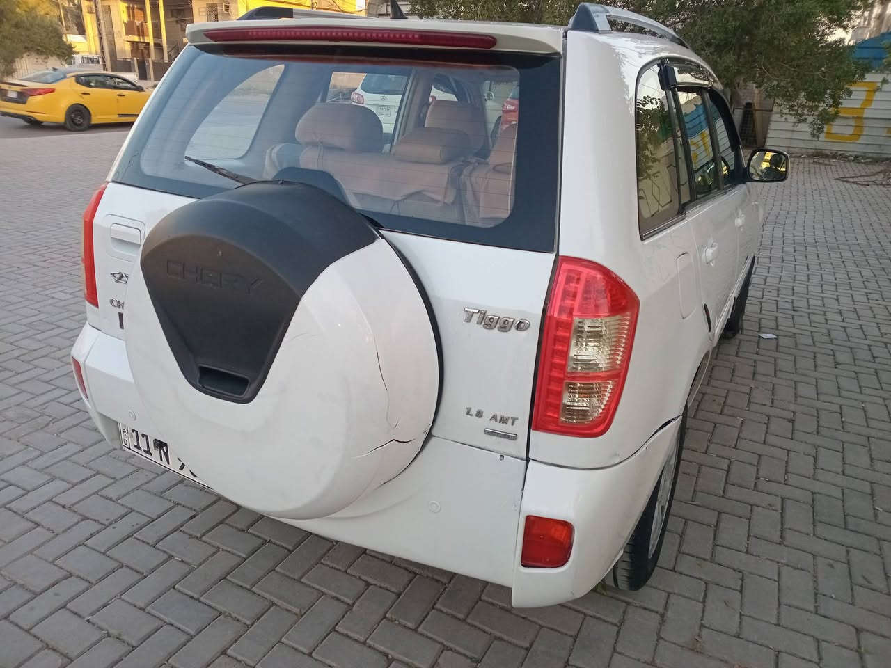 السلام عليكم للبيع شيري تيكو موديل 2013 الشركه العامه كير اوتوماتك كهربائي باسمي الرقم الدولي الجديد بيها قطع صبغ اثر طخات بدون دواخل *********** مكان السياره بغداد العامريه السعر 58$ شاشه كبيره كامرة حساسات خلفيه تدفئه كراسي ارضيه جلد *********** وتحياتي للجميع
