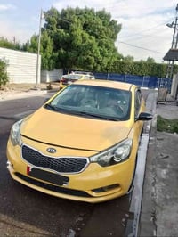 كيا فورتي موديل 2014 حادث جاملغ وبنيد رقم بغداد السعر 103ورقه وبيه مجا...