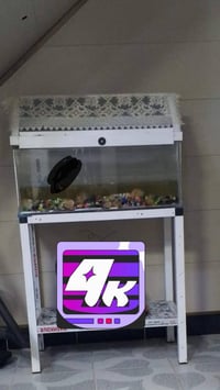 حوض سمك • ٣٠ • مع مجال