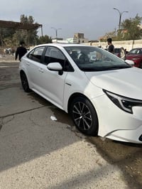 كورلا هايبرد   موديل 2024 رقم اربيل   سياره جديده جداً بحاله والوكالة ...