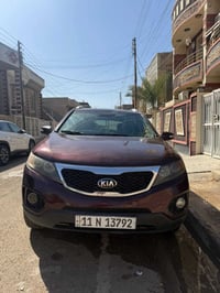اخوان كيا سورنتو لًلبيع موديل ٢٠١٢ شكل ٢٠١٣  وارد أمريكي لون اسود بيتن...