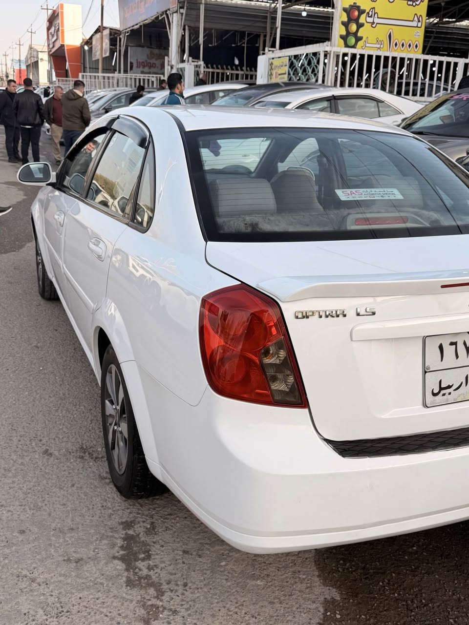 سلام عليكم 
أوبترا 2010
جاملغ وبونيد مبدل بدون دواخل 
وهلال خلفي 
اوتماتيك صدر محرك كير تايرات كله بالشرط 
دفتر بانزين كامل 
مكاني كركوك 
*********** كركوك, العراق
