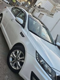 اوبتما ٢٠١١ • محرك ٢٠٠٠ • رقم بغداد دولي