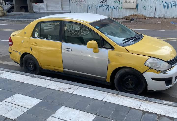 نيسان فيرسا 2008 رقم نجف مشروع وطني 
تحويل بشرط مكينة 2000 جديدة ..تخم تاير جديد گير ناصي جديد  I T..للاستفسار الاتصال ***********.. المكان بغداد الكرادة ..
