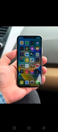 ايفون اكس ٦٤ • مبدل بطارية • حي وحده