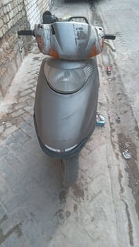 دراجه سبيسي  نضيفه شغاله ابيعها عاطله باتري وهندر 250/ 07712795603