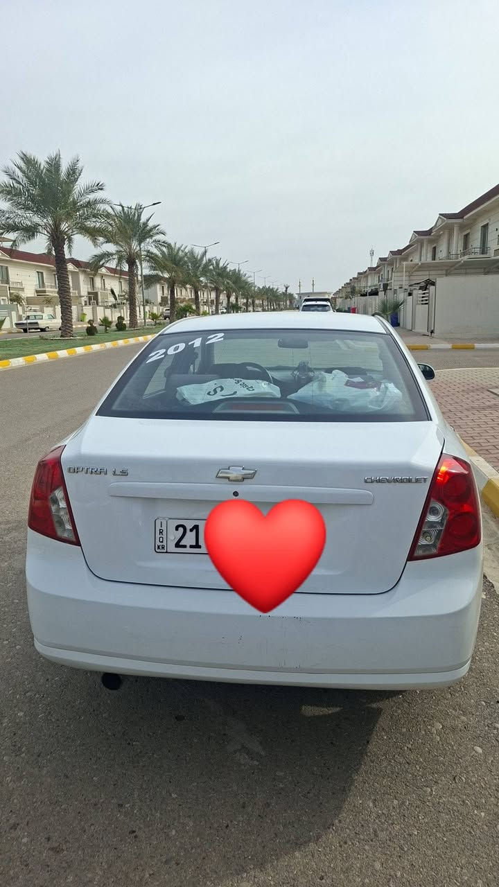 اوبترا  موديل 2012 كير عادي سنويه جديده لحد 2030 سياره بسمي دفتر بانزين بي سعر 88بي مجال بسيط *********** كركوك  رقم سليمانيه

