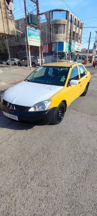 لانسر ٢٠٠٩ • مكينة ٢٠٠٠ • بدون حادث