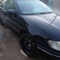 سياره للبيع   اوبل بزون مديل 94  رقم بغداد راعيه يريد تحويل  كير اتو ف...