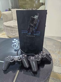 بلي ستيشن 2  الجهاذ نضيف  الجهاذ بي هارد وثنين يدات   ويا كامل الملحقا...