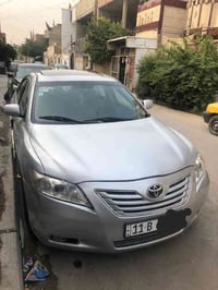 🚗 للبيع — تيوتا كامري 2009 📍 رقم بغداد – بأسمي  السيارة 🔹 حادث: جاملوغ...