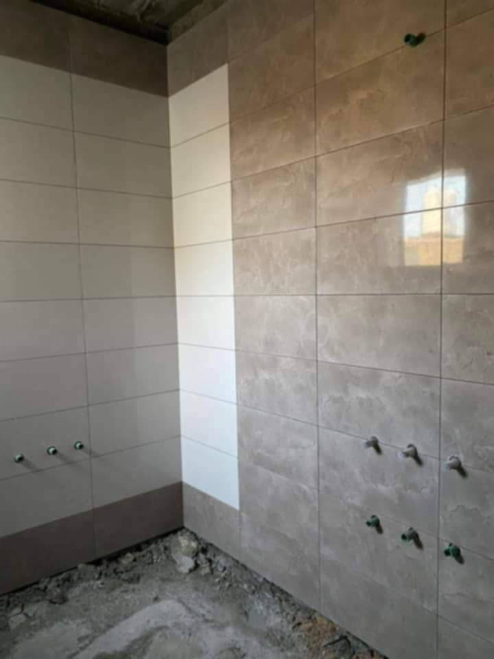 خلفه سراميك وبورسلين ومرمر *********** مكاني واسط
