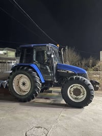 نيو هولند • ماكينة • موديل ٢٠٠٢