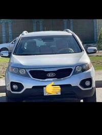 سورنتو 12 خليجي  محرك 4 دوش  7 راكب  السياره مكفوله   رقم بغداد  السعر...