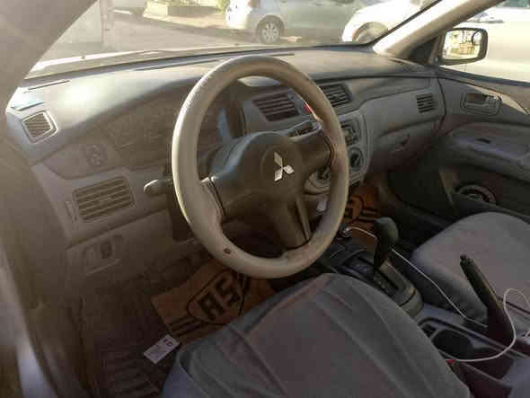 لانسەر مۆدێل ٢٠٠٨ مەکینە گەورە یەک پارچەی هەیە چاملغی لای سەکن گێرو مەکینە بەشەرت تەبریت بە شەرت*********** Singapore
