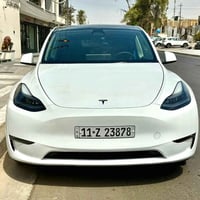 تسلا Y موديل 2023 رقم بغداد بأسمي السياره فول اعلى فئه نظيفه جدآ وصارف...