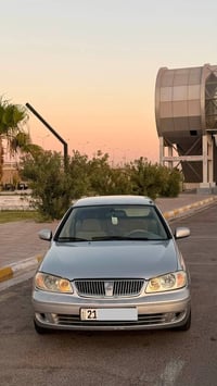 للبيع سياره نيسان سني موديل 2006ياباني اصل محرك اسود ودشبول ابيض  محرك...
