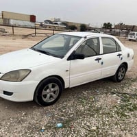 لانسر ميسي بوشي • ٢٠٠٤ • مكينة وكير مكفولة