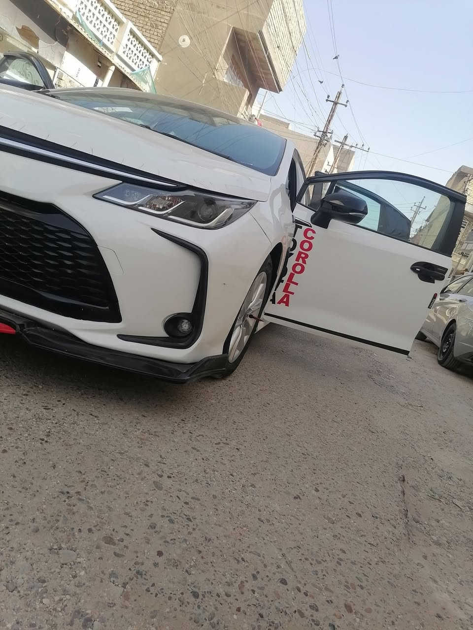 السلام عليكم ورحمة الله وبركاته كورلا هايبرد تجميع الصين خليجي شكل الساز
هايبرد بانزين موديل ٢٠٢٣ اللون ابيض السيارة مكفولة من الصبغ والضربة عدا بارد مكانين زغار بالذيل مال جاملغ أمامي مال سايق بحافة الباب بصفة بالصندوك يم علامة هايبرد بيهة ثلاث أصابع تقريبا السيارة ماشية ٥٧ الف وعلامة زركة ومكينة 1800cc  كير ثلاث وضعيات قيادة تبريد قطعتين ثلج  داخل احمر بلاد  شاشة كار بلي وكامرا دوارة فول اجدي ويل كب بلادي فتحة سقف بانوراما طكتين رادار وتحديد مسار وقيادة ذاتية تزحلق وتحكم ستيرن جهتين فول فول عليهة كت اسود لماع من الدعامية للدعامية كامل بصمات ثنين كتلوكات مال شركة فرشات مال شركة بالنايلون مكان السيارة بغداد الأمين الثانية قرب جامع المحسن حيدر *********** أو ***********  السعر ١٣٤ وبيهة مجال حق الجية
