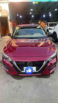 🚗🔥 للبيع — نيسان سنترا SR موديل 2023 / لون موروني 🔥🚗 سيارة نظيفة فوق ا...