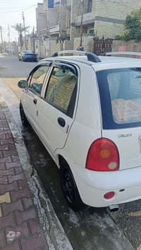 للبيع كيو كيو كير عادي موديل 13 رقم انكليزي بسمي مكان بغداد الحسينية ر...