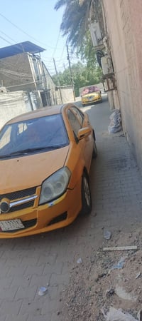 جيلي ٢٠١١مصفرة هية وغرمات تحويل مباشر سعرة ١٨مكاني بغداد المحمودية 078...
