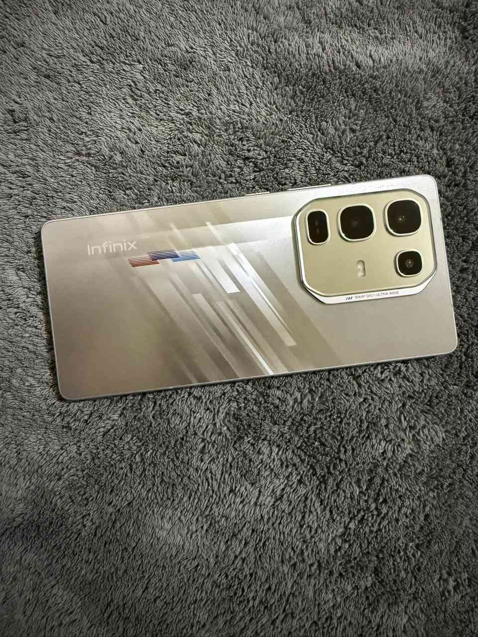 nfinix Note 50 Pro
للبيع مستخدم فترة قليلة جدا جدا فتح كارتون للبيع 

نسخة 12GB +12 =24 GB 
 
((((سعره :٢٨٠ الف)))
سعر الجديد الحالي :٣٣٥ الف 

إليك ملخص شامل ومرتب لأبرز مواصفات الجهاز:

📱 الشاشة (Display)
• النوع: AMOLED فائقة الوضوح.
• الحجم: 6.78 بوصة.
• السرعة: تدعم معدل تحديث 144Hz (سلاسة عالية جداً في الألعاب والتنقل).
• السطوع: يصل إلى 1300 شمعة (وضوح ممتاز تحت أشعة 
الشمس).

🚀 الأداء والذاكرة (Performance & Memory)

• المعالج: MediaTek Helio G100 Ultimate (بتقنية 6 نانومتر)، وهو معالج قوي للفئة المتوسطة.
• الذاكرة العشوائية (RAM): سعة 12 جيجابايت فعلية، وتصل إلى 24 جيجابايت عبر ميزة التوسعة (Extended RAM) كما هو موضح على العلبة.
• ذاكرة التخزين: 256 جيجابايت.

🔋 البطارية والشحن (Battery & Charging)
• السعة: 5200 مللي أمبير.

• الشحن السلكي: سريع جداً بقدرة 90 واط (شحن كامل في وقت قياسي).

• الشحن اللاسلكي: يدعم تقنية MagCharge بقدرة 30 واط.

• ميزات إضافية: يدعم الشحن العكسي (لشحن أجهزة أخرى) 
وتقنية Bypass Charging (للحفاظ على البطارية أثناء الألعاب).

📸 الكاميرات (Cameras)

• الخلفية: أساسية بدقة 50 ميجابكسل مع مثبت بصري (OIS) لمنع اهتزاز الصور، وعدسة واسعة بدقة 8 ميجابكسل.

• الأمامية: بدقة 32 ميجابكسل لصور سيلفي عالية الجودة.
🔊 الصوت والإضافات

• الصوت: مكبرات صوت مزدوجة (Stereo) بتعاون مع JBL، مما يوفر تجربة صوتية نقية ومحيطية.

• الذكاء الاصطناعي: مزود بتقنيات Infinix AI لتحسين الأداء والتصوير بلمسة واحدة.

• الحماية: مقاوم للغبار ورذاذ الماء بمعيار IP64، وبصمة إصبع مدمجة تحت الشاشة.


**إذا كنت صاحب هذا الإعلان وتريد حذفه لأي سبب، رجاءا أرسل رسالة إلى الدعم الفني**