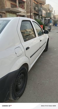 رينو لوجان • ٢٠١٠ • رقم بغداد