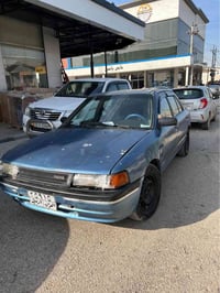 مازدا ٣٢٣ • ١٩٩٠ • كلاج جديد