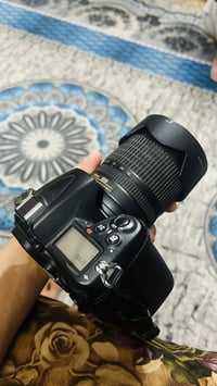 نيكون 7000 بطاريه وحده + رام + شاحنه بطارية + عدسه 70-300 و عدسه 18-10...