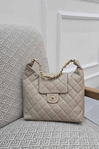 عرض ٣٤سم • ارتفاع ٢٤سم • كوالتي