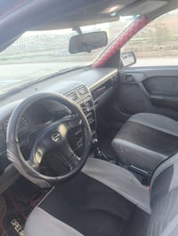 فيكترا حجم 18موديل 93  رقم دهوك شرط التحويل كابون بانزين  محرك كير شرط...