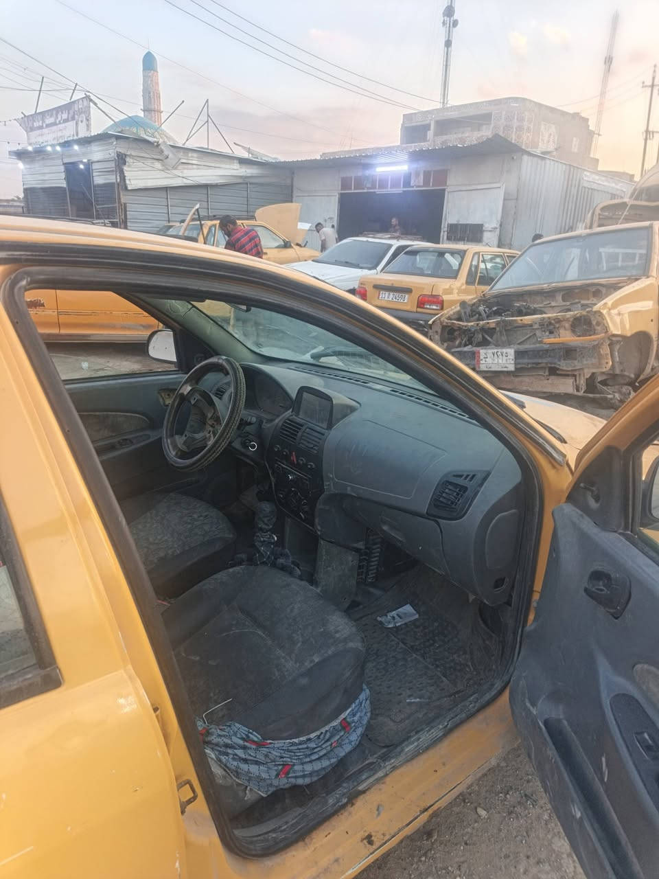 السلام عليكم طيبه موديل 16 رقم بغداد مصفر هيئه غرامات سياره عاوزها ترتيب السعر 23 ورقه وبيها مجال بسيط عنوان ***********بغداد الزعفرانيه***********#
