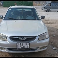 اكسنت • ٢٠٠١ • يحتاج كمبريسر
