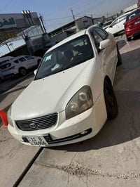 كيا اوبتما 2007 خليجي 6 سلندر 2700 بيها جاملغ مبدل اليمين وبيها رصعات ...