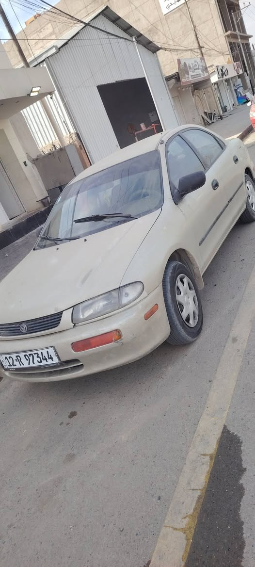 مازده موديل ٩٧ حجم 323 مكينه وكير حاويه شرط سنويه جديده رقم دولي شرط التحويل بيع او مراوس مع بيجو 306 مكاني موصل ***********
