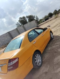 جيلي موبل 2012 رقم بغداد الماني مكفوله  مكاني ديوانيه....  //رقمي 0777...