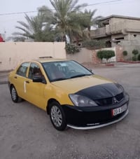 لانسر ٢٠١٠ • مكينة ١٦٠٠ • رقم ديالى