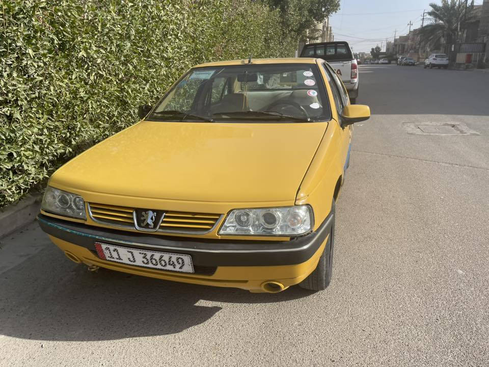 بيجو 405 للبيع كير ومحرك وتبريد شغال نقد وأقساط مكاني بغداد وبسمي ***********
