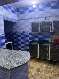 الكوفه قرب السوق • ١٣٥م • مشتمل معزول