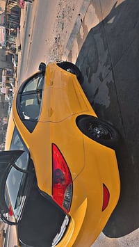 اكسنت مضلع  رقم بغداد  موديل 2014  بسمي مشروع وطني   ارقام جديده. انكل...