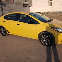 كيا فورتي • ٢٠١٥ • اصفر